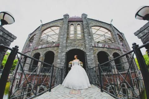 Seductive young bride posing on the territory of country hotel Stock Photos