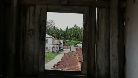 See Mikindani through a small window Stock Footage 163982772