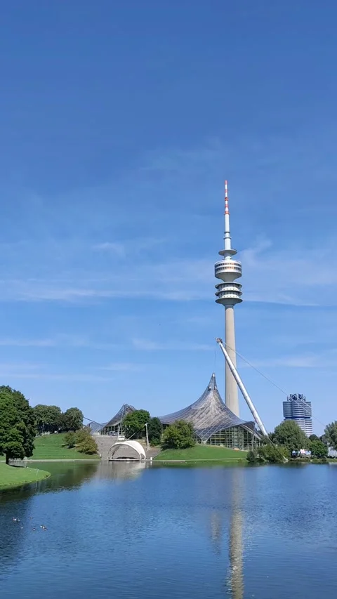 See the Olympic Park Munich tower from the lake Stock Footage 219954819