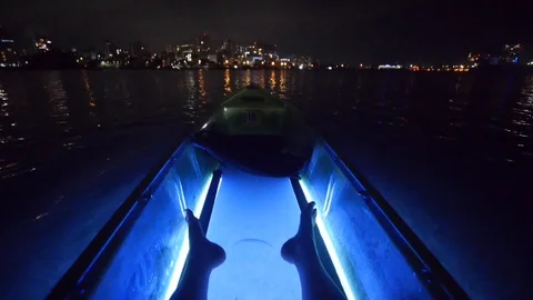 See-Through Clear Bottom Night Kayak Stock Footage 118547098