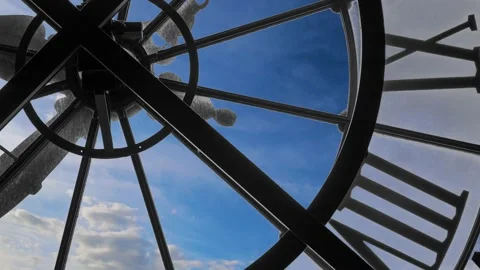 See Through the Clock blue sky Clouds, motion Background, Time Lapse.  Stock Footage 228679128