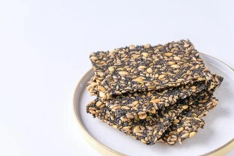 Seed crackers on white background Stockfoto's
