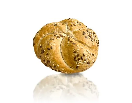 Seeded Kaiser roll bread bakery wholegrain sesame flax fresh bun isolated o.. Stock Photos