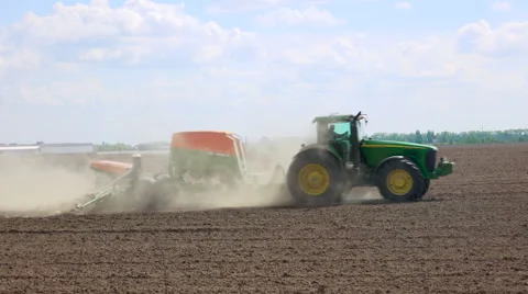 Seeding machine in the field Stock Footage 62735327