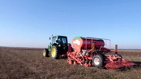 Seeding machine at work. Long shot Stock Footage 113647936