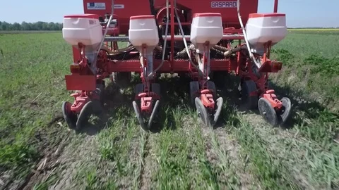 Seeding machine at work on a no till native grass stand Stock Footage 113647794