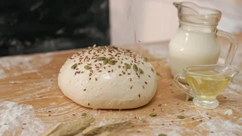 Seeds Falling On Round Dough Stock Footage 273501167