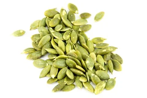 Seeds of pumpkin on white background Stock Photos
