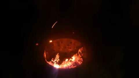 Seeing the inside of a pellet stove - small flames and pellets 스톡 동영상 122729414
