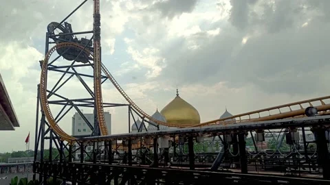 Seeing a roller coaster from inside a mall in Bandung, Indonesia Stock Footage 218976068