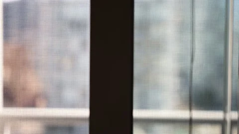 Seeing the view balcony through the screen door Stock Footage 150918473