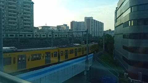 Seeing a Yellow Train through a window Stock Footage 266865012