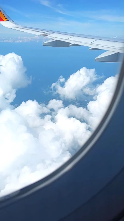 Seen the view of the clouds from the plane Stock Footage 212760669