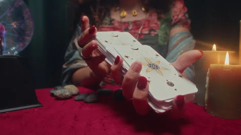 Seer Shuffling Deck of Tarot Cards during Prediction Session Stock Footage 253182466