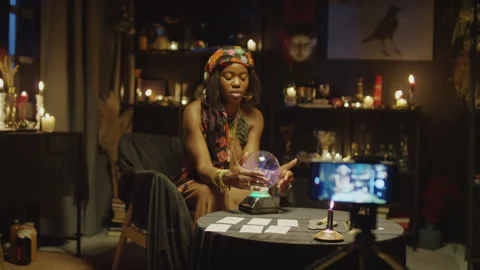 Seer Videoblogging Session with Crystal Ball on Smartphone Stock Footage 247638333