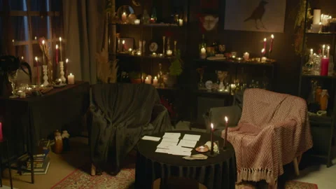 Seers Studio in Dark Colors with Burning Candles Stock Footage 247639742