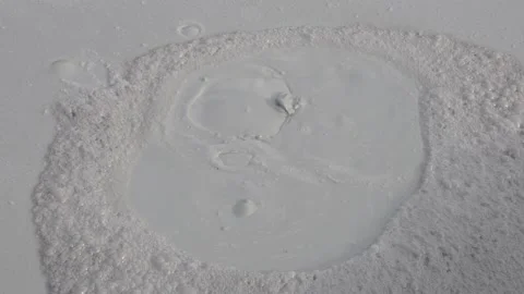 Seething crater of a mud volcano Stock Footage 189360811