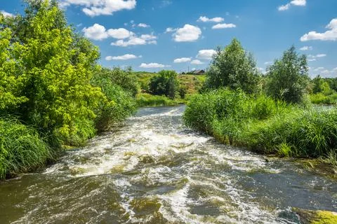 Seething rapids on the small river Stock Photos