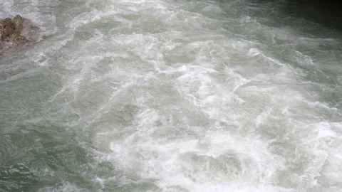 The seething stream of a mountain river Stock Footage 168185083