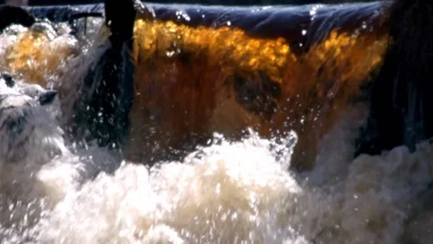 Seething streams of water in the sun rays. Stock Footage 185752322