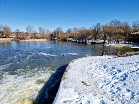 Seething water at the dam in the spring Stock Photos