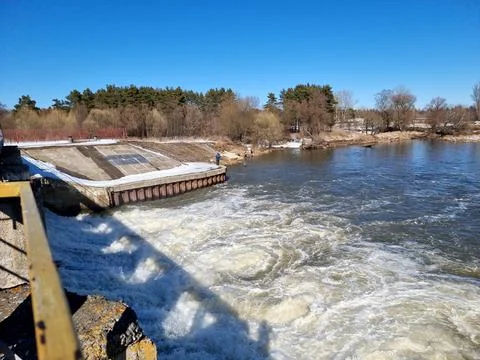 Seething water at the dam in the spring Stock Photos