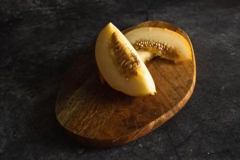 Segment of melon and two slices Stock Photos