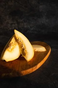 Segment of melon and two slices Stock Photos