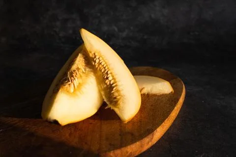 Segment of melon and two slices Stock Photos
