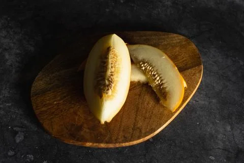 Segment of melon and two slices Stock Photos