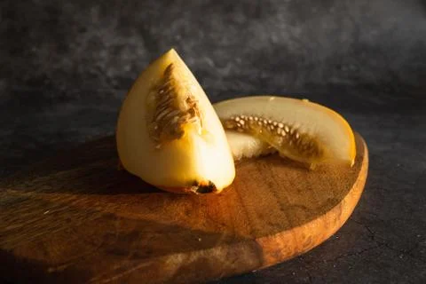 Segment of melon and two slices Stock Photos