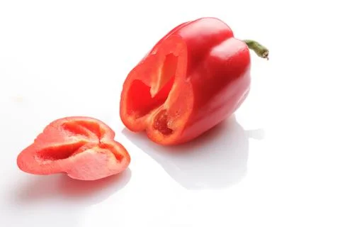 A segment of red bell pepper Stock Photos