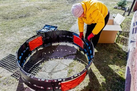 Segmented compost container assembled piece by piece from modular plastic p.. Stock Photos