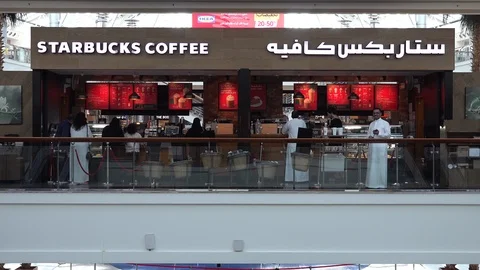 Segregated ordering and seating areas in Starbucks branch Saudi Arabia Stock-Footage 125719468