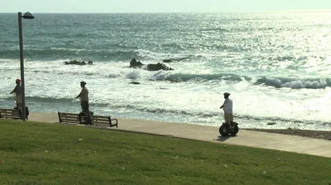 Segway driving by the seashore Stock Footage 8599283
