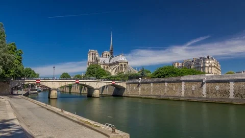 Seine and Notre Dame de Paris timelapse hyperlapse is the one of the most famous Stock Footage 80588601
