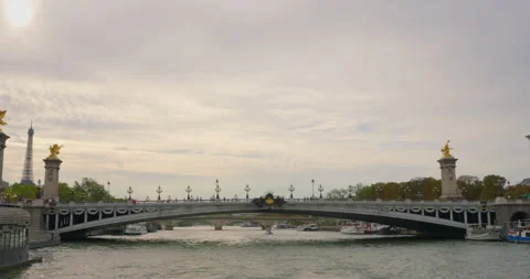 Seine river, bridge called Pont Alexandre III and Grand Palace in Paris. It is a Stock Footage 252816796