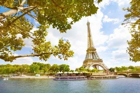 Seine river on Eifel tower through sunny sky 스톡 사진