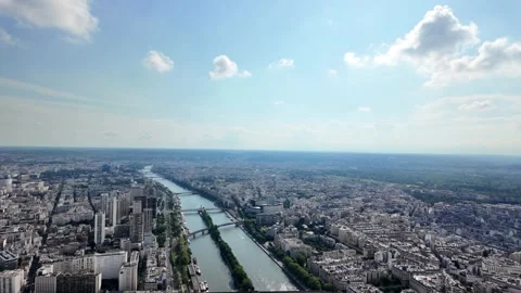 Seine river flowing through the expansive cityscape of paris, france Stockbeeldmateriaal 328023222