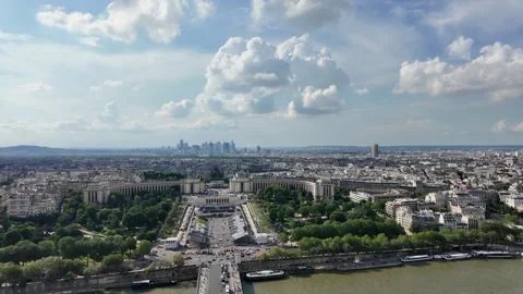 Seine river flowing through the expansive cityscape of paris, france Vídeos de archivo 328023283