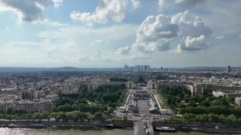 Seine river flowing through the expansive cityscape of paris, france Vídeos de archivo 328023289