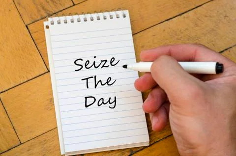 Seize the day concept on notebook Stock Photos