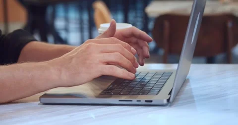 Select best solution. Hands of man typing on keyboard based on your evaluation Stock Footage 255141640