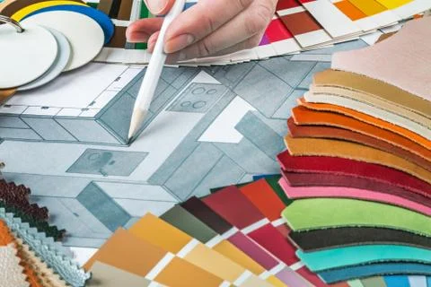 Select a color from the color sample pallets in the designer's workspace Stock Photos