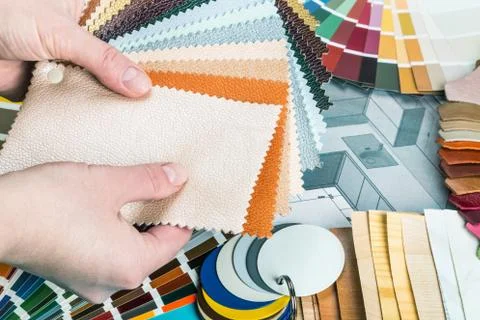 Select a color from the color sample pallets in the designer's workspace Stock Photos