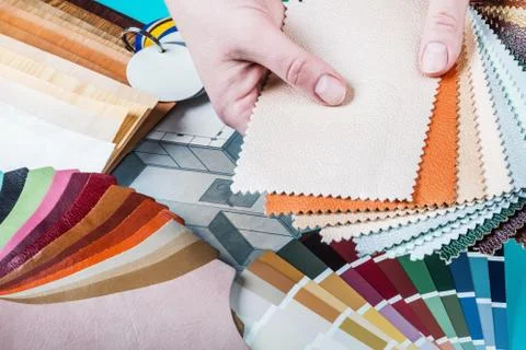 Select a color from the color sample pallets in the designer's workspace Stock Photos