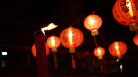 Select focus large red incense stick burn during devotion at temple Vídeos de archivo 221788919
