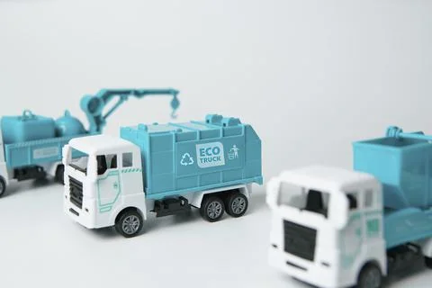 Select focus middle Trucks model and Garbage truck on white background Foto stock