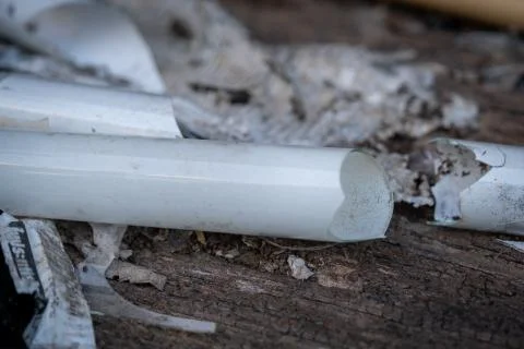 The select focus Pile of broken fluorescent light bulb is danger for health w Stock Photos