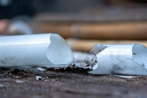 Select focus Pile of broken fluorescent light bulb is danger for health with Stock Photos